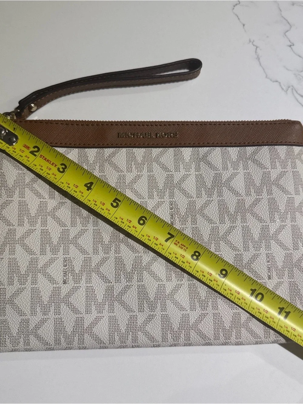 Michael Kors Beige MK Monogram clutch/wristlet with Brown Trim